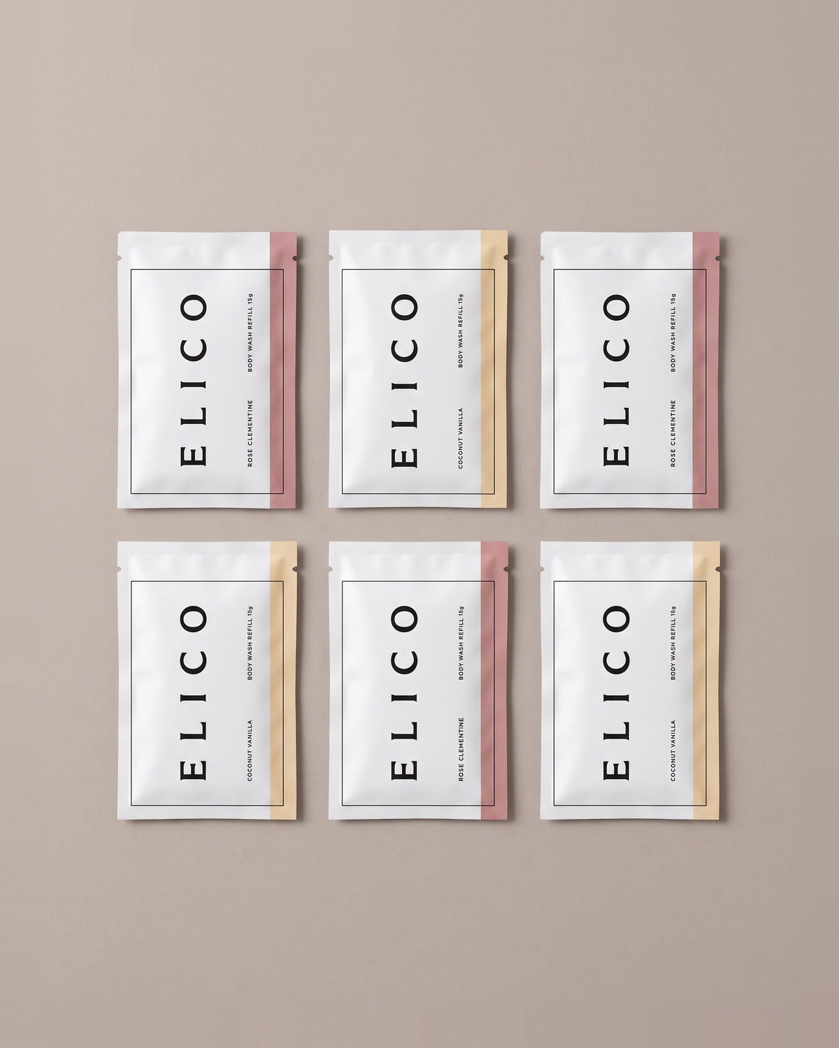 Body Wash Refillår: innhold sett ovenfra, seks refill-sachets, tre Rose & klementin og tre Kokos & vanilje